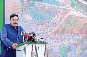 Sheikh Rasheed starting the plastic road program.