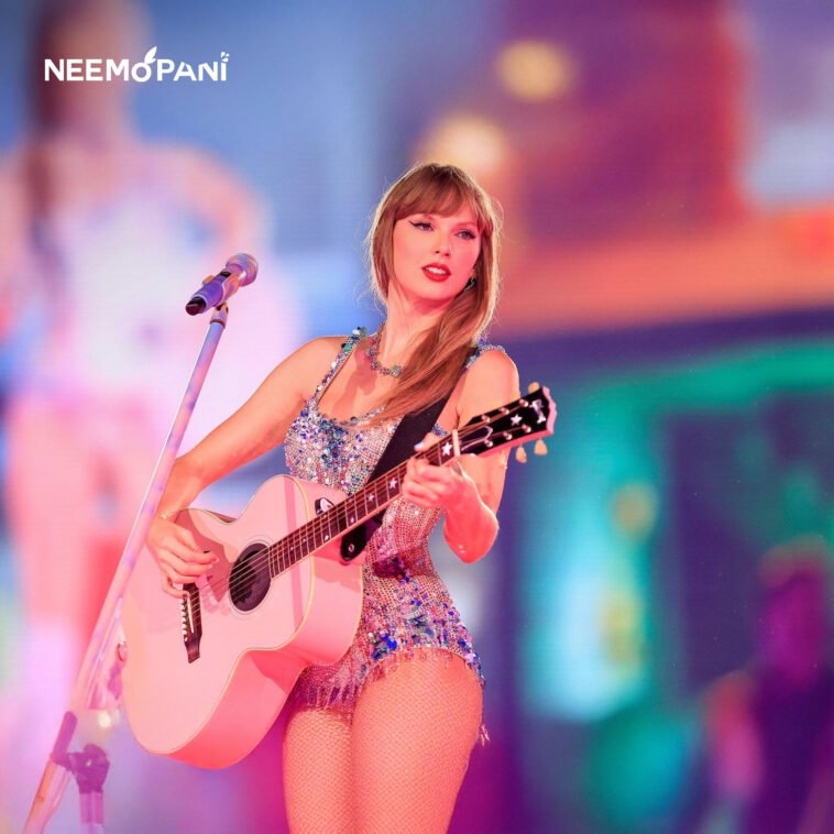 Taylor swift at her concert performing